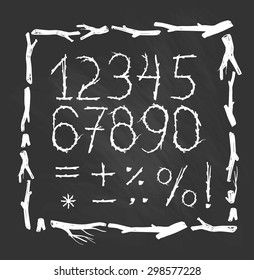 Hand drawn vector figures made of branches of tree isolated on the chalkboard . Natural tribal font.