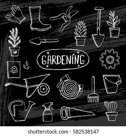 Hand drawn vector garden icon set. Vintage sketch set of hand drawn gardening tools and plants. Gardening sketches isolated on white background.