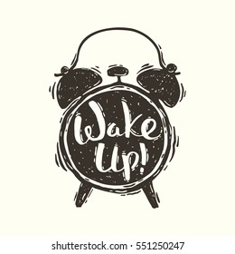 Hand drawn vector grunge illustration of the alarm clock with handwriting inscription Wake up!