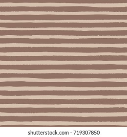 Hand drawn vector grunge stripes of pastel brown color seamless pattern on the beige background. Texture for your design.
