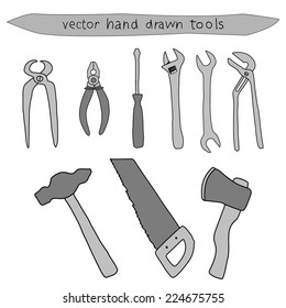 Hand drawn vector household tool set of a hammer, ax, saw, screwdriver, pliers and wrench isolated on white 