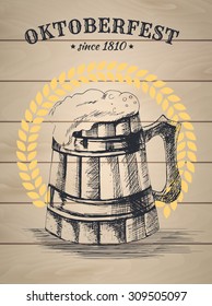Hand drawn vector illustration of beer mug.  Oktoberfest  beer poster vintage poster with wooden light background . Oktoberfest celebration design, eps10.
