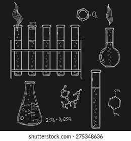 Hand drawn vector illustration. Chemistry laboratory icons sketch. Science design objects in doodle style. Chalk on a blackboard.