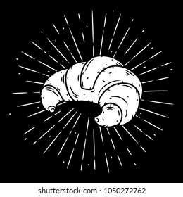 Hand drawn vector illustration with croissant and divergent rays. Used for poster, banner, web, t-shirt print, bag print, badges, flyer, logo design and more. 