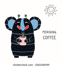 Hand drawn vector illustration of a cute funny monster holding a mug cup, with lettering quote Morning coffee. Isolated objects on white background. Concept for children print.