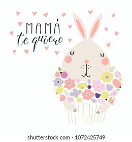 Hand drawn vector illustration of a cute bunny with a bunch of flowers and quote Love you Mom in Spanish, Mama te quiero, with hearts. Isolated on white. Design concept for Mothers Day banner, card.