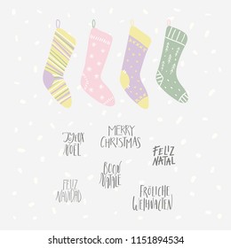 Hand drawn vector illustration of cute Christmas stockings, with quotes Merry Christmas in different languages. Isolated objects on white background. Flat style design. Concept for card, invite.