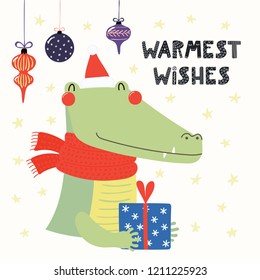 Hand drawn vector illustration of a cute crocodile in a Santa Claus hat, scarf, with gift, text Warmest wishes. Isolated objects on white. Scandinavian style flat design. Concept for Christmas card.