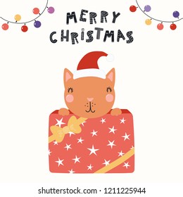 Hand drawn vector illustration of a cute funny cat in a Santa hat hiding in a gift box, with text Merry Christmas. Isolated objects on white. Scandinavian style flat design. Concept for card, invite.