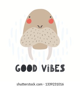 Hand drawn vector illustration of a cute funny walrus face, with lettering quote Good vibes. Isolated objects on white background. Scandinavian style flat design. Concept for children print.