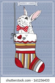 Hand Drawn Vector Illustration of Cute Bunny in Christmas Sock, Greeting Card