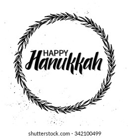 Hand drawn vector illustration. Happy hanukkah. Lettering and calligraphy. Wreath and laurel