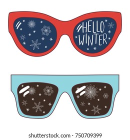 Hand drawn vector illustration of oversized sunglasses, with text Hello Winter, snowflakes reflected inside the lenses. Isolated objects on white background. Design concept for change of seasons.