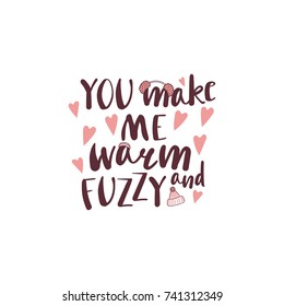 Hand drawn vector illustration with a quote You make me warm and fuzzy, fluffy pink earmuffs, knitted hats, hearts. Isolated objects on white background. Design concept winter, autumn, love.