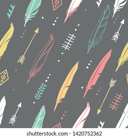 Hand drawn vector illustration. Seamless pattern with tribal arrows on dark gray background. Perfect for wallpapers, greeting cards, blogs, web page background and more