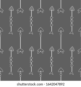 Hand drawn vector illustration. Seamless pattern with tribal arrows