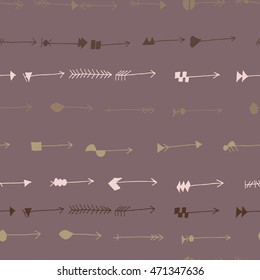 Hand drawn vector illustration. Seamless pattern with tribal arrows. Perfect for wallpapers, greeting cards, blogs, web page background and more.