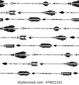 Hand drawn vector illustration. Seamless pattern with tribal arrows. Perfect for wallpapers, greeting cards, blogs, web page background and more.