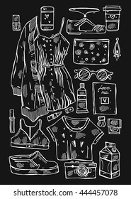 Hand drawn vector illustration set of girls stuff isolated on black.Collection of woman things.Lookbook.Vogue fashion journaling illustration of underwear,sun glasses,dress,women's shoes,cardigan