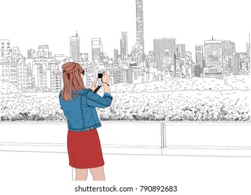 Hand drawn vector illustration of a stylish young woman taking a photo of the Manhattan skyline from a rooftop. Black and white except for the woman.