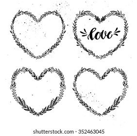 Hand drawn vector illustration. Vintage decorative collection of laurels and wreath in shape heart. Tribal design elements. Perfect for invitations, greeting cards, quotes, blogs, posters and more.