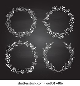 Hand drawn vector illustration. Vintage decorative laurel wreaths. Tribal design elements on chalkboard background. Perfect for invitations, greeting cards, blogs, prints and more.