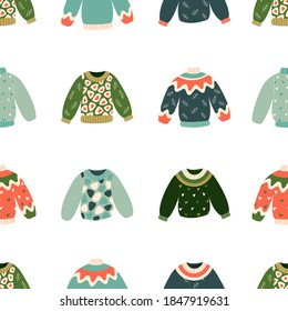 Hand drawn vector illustration of warm winter and autumn woolen sweaters in Scandinavian style, executed as vector seamless pattern. Trendy flat design elements for winter clothes. 