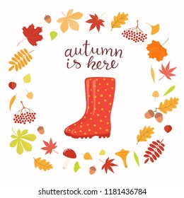 Hand drawn vector illustration with wellington boots, frame of leaves, lettering quote Autumn is here. Isolated objects on white background. Flat style design. Concept seasonal banner, poster, card