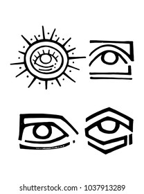Hand drawn vector ink illustration or drawing of some tribal eyes symbols