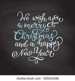 Hand drawn vector lettering We wish you a merry Christmas and Happy New Year.. Isolated calligraphy on black chalkboard. Quote about winter and Christmas.