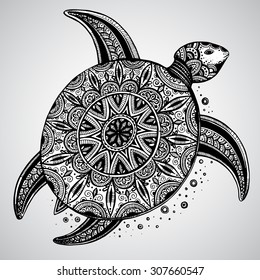 Hand drawn vector monochrome doodle turtle decorated with oriental ornament. Zentangle tribal stylized animal.