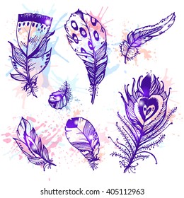 Hand drawn vector painted bird feathers isolated on white background with paint splash. Color set for your design. Trendy boho style patterned elements, sketch, tribal concept