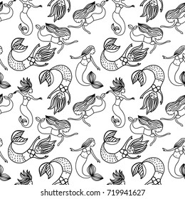 Hand drawn vector pattern with playful mermaids swimming in a sea. Textile ornament, wrapping paper, surface print design.