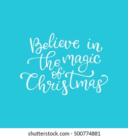 Hand drawn vector quote. Believe in the magic of Christmas. Isolated white ink calligraphy on bright blue background. Quote about winter and Christmas.