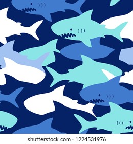 Hand drawn vector seamless camouflage pattern with cute sharks on blue background.  Perfect for fabric, wallpaper or wrapping paper.