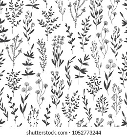 Hand drawn vector seamless pattern with floral elements, herbs, leaves, flowers, twigs, branches