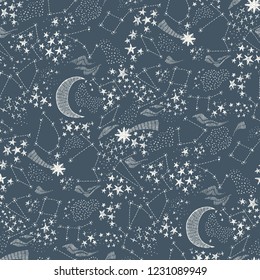 Hand drawn vector seamless pattern background with stars, comet, constellation drawing in sketch doodle style in dark backdrop 