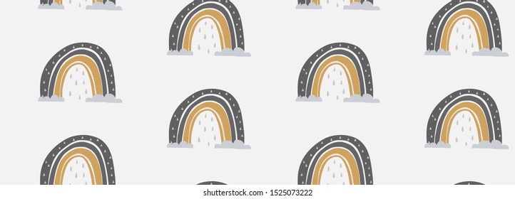 Hand drawn vector seamless pattern illustration of a cute rainbow. Scandinavian style flat design for kids. The concept for children's textiles, wrappings, wallpapers, covers.