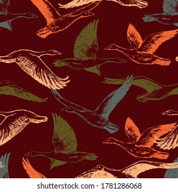 Hand drawn vector seamless pattern of flying greylag geese. Background of wild birds realistic ink sketches. Abstract colorful design for wallpaper, wrapping, textile, postcard, print, fabric, decor.