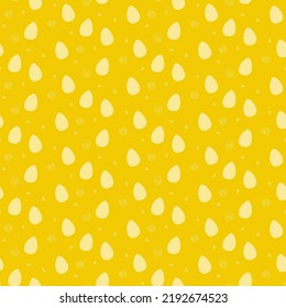 Hand drawn vector seamless pattern of small easter eggs in yellow colors with various elements.