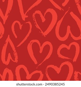 Hand drawn vector seamless pattern with red hearts made with crayons or brush