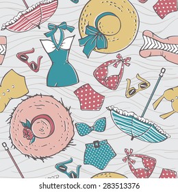 Hand drawn vector seamless pattern with retro swimsuits
