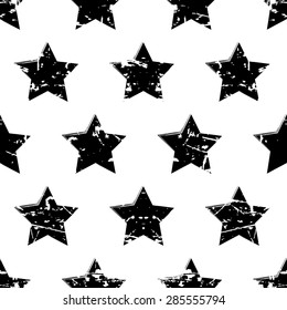 Hand drawn vector seamless pattern with black stars isolated on white background. Abstract grunge texture.