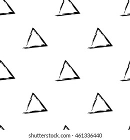 Hand Drawn vector seamless pattern made with ink. Triangles shapes isolated. Fabric texture