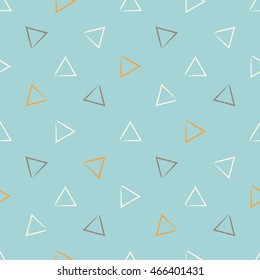 Hand Drawn vector seamless pattern. Orange, brown and turquoise triangles. Fabric design.