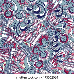 Hand drawn vector seamless pattern with doodle elements with blue and pink colors.