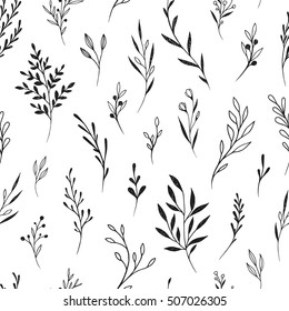 Hand drawn vector seamless pattern with floral elements. Vector pattern with leaves, twigs, branches, berries, grass. Black and white.