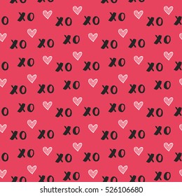 Hand drawn vector seamless pattern with XOXO on red background. Hipster symbols of hugs and kisses. Good for cards, wallpaper, posters, wrapping paper, Valentine's invitations