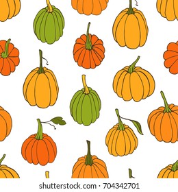 Hand drawn vector seamless pattern with pumpkins on white background. Design element for fabric, textile, wrapping paper, food package. Autumn collection.