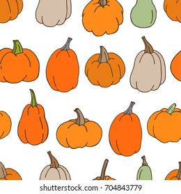 Hand drawn vector seamless pattern with pumpkins on white background. Good for fabric, textile, wrapping paper, food package. Autumn collection.